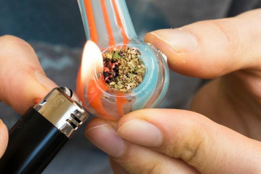 Pipe Full of Weed Being Used